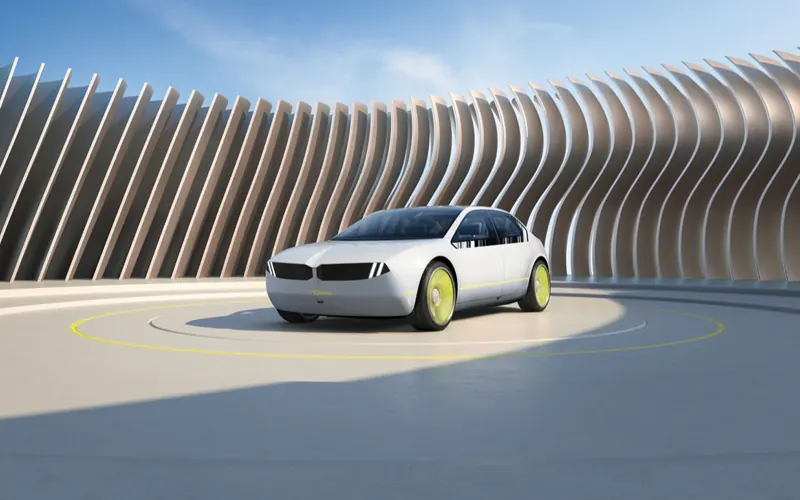 BMW Vision Dee in front of a curved white structure